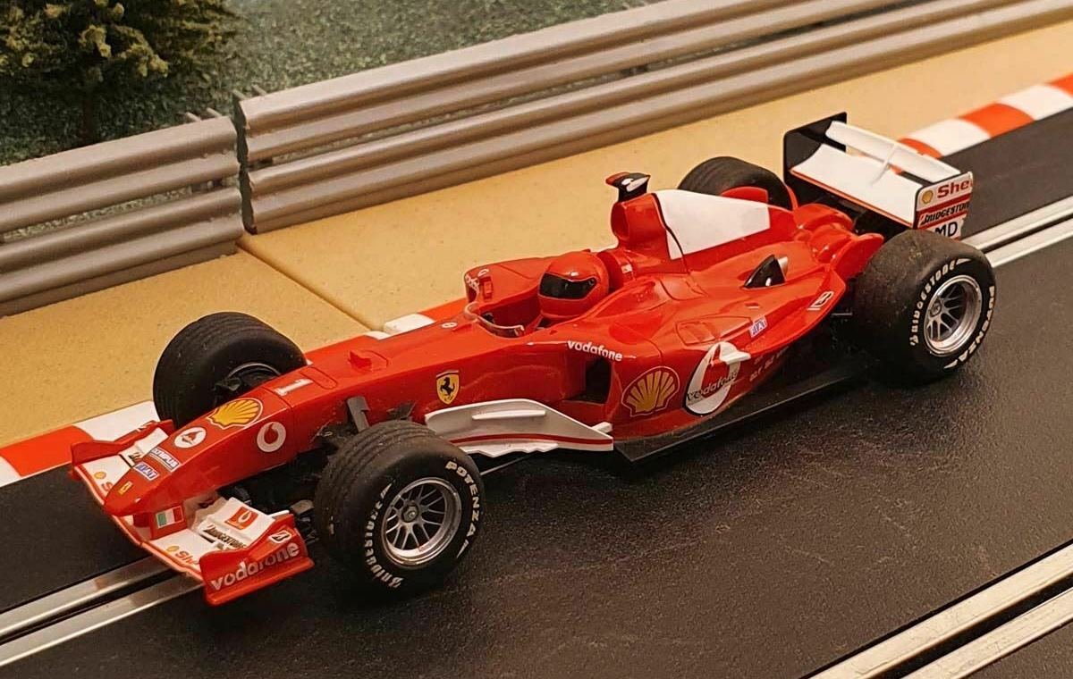 SCX 61730 Ferrari F2004 Michael Schumacher 2004 Champion Scala 1 32