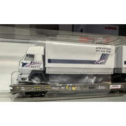 Roco HO 67530 HUPAC lavgulvsvogn mellem mellemliggende vogne "Rullende landevej" lastet med et Steyr-vogntog.